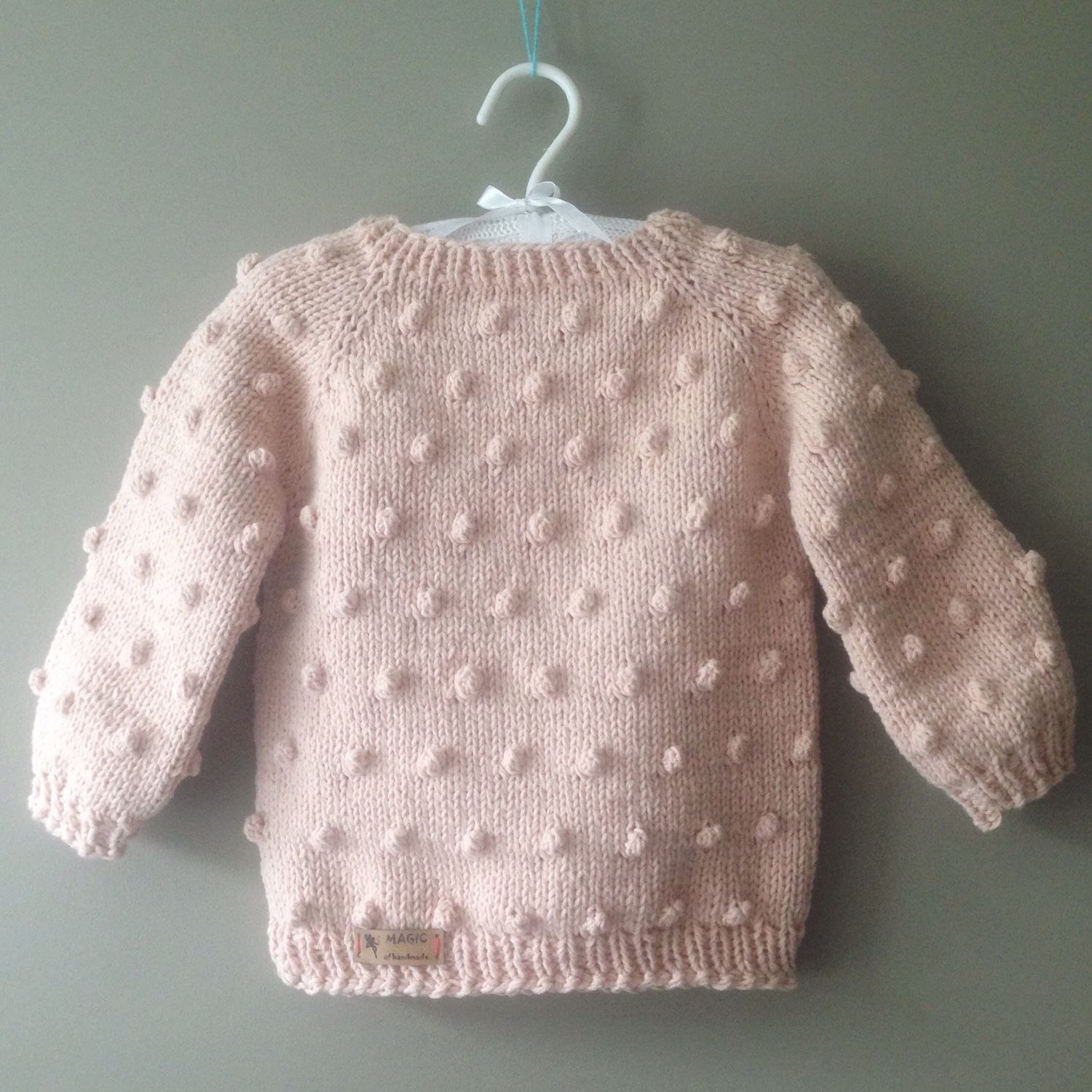 Детский вязаный свитер для девочки