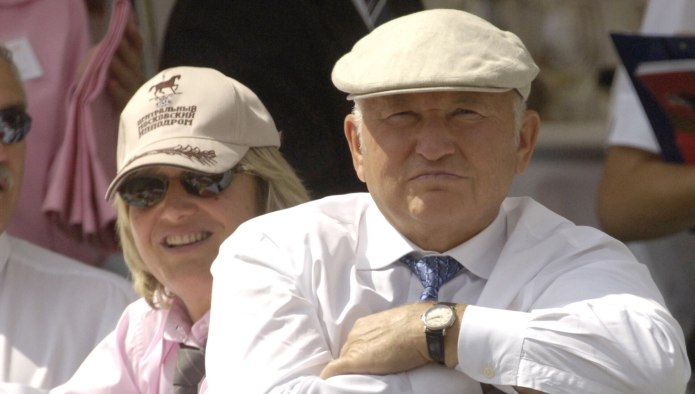 Елена Батурина в кепке