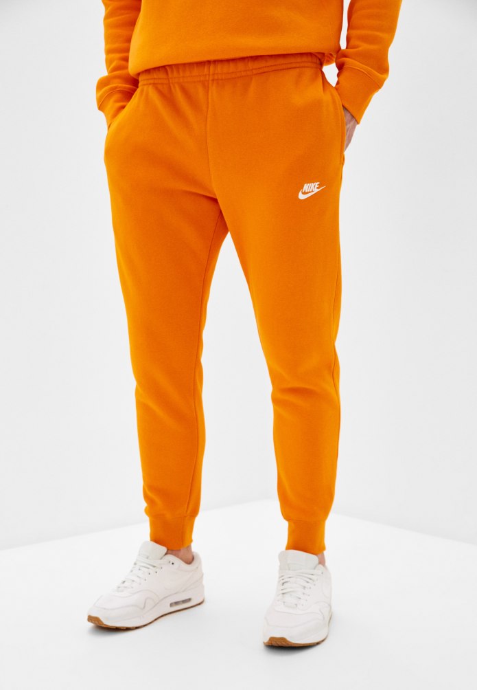 Оранжевые штаны Stone Island