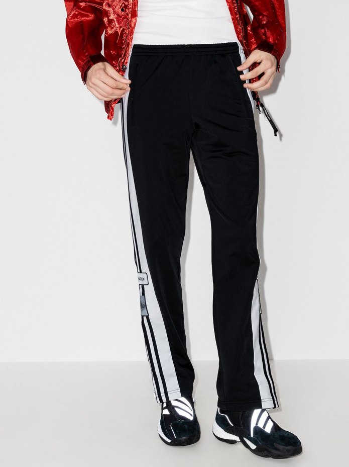 Синие штаны adidas Originals с лампасами